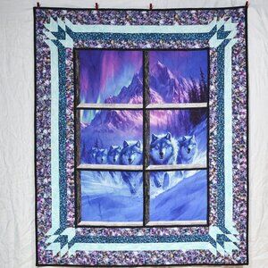 New, handmade, large throw quilt of beautiful wolves with aurora borealis in the